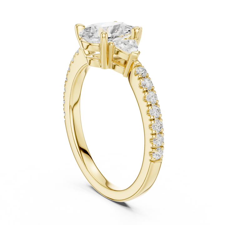 Pear Cut Diamond Three-Stone Engagement Ring with Pave Band