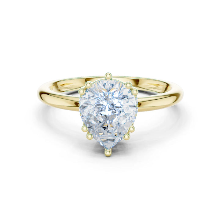 Pear Cut Diamond Solitaire Engagement Ring with Hidden Accent Diamonds