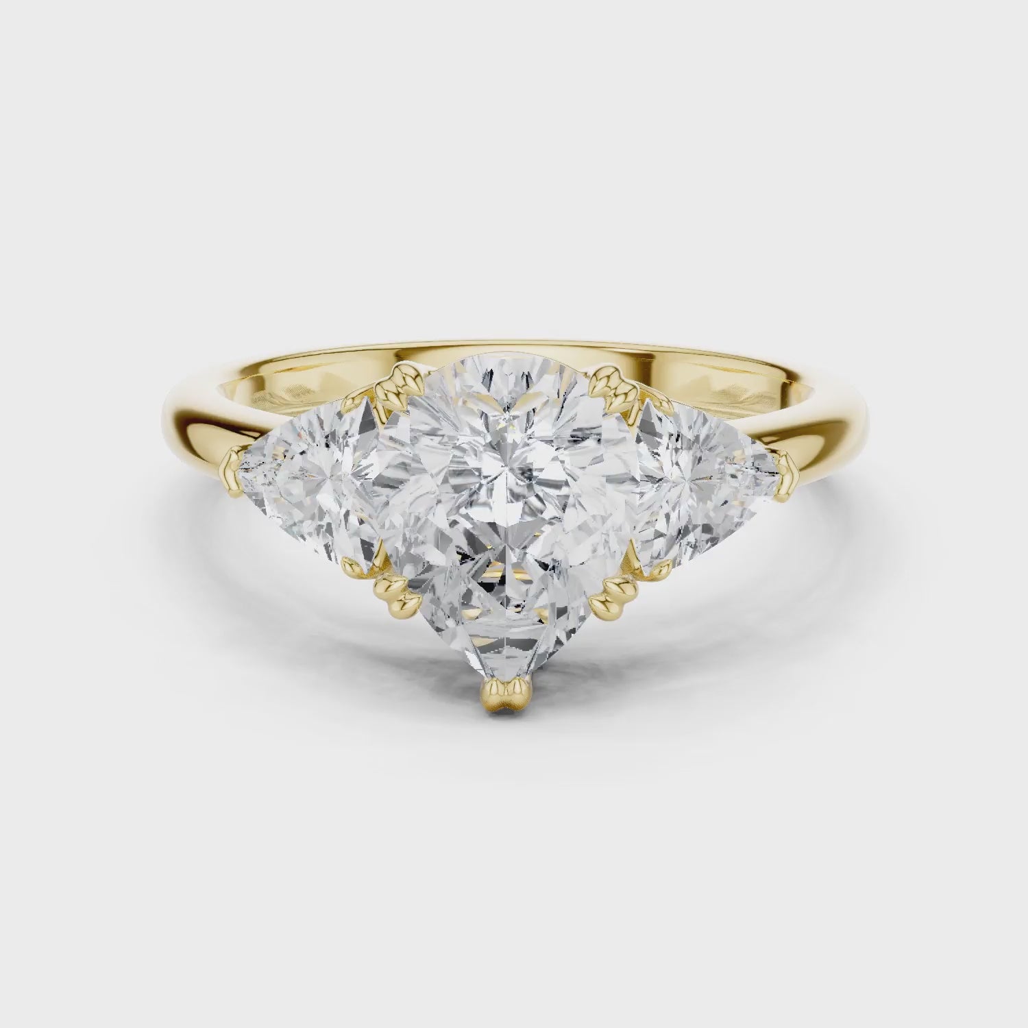 Pear Cut Diamond Three Stone Engagement Ring