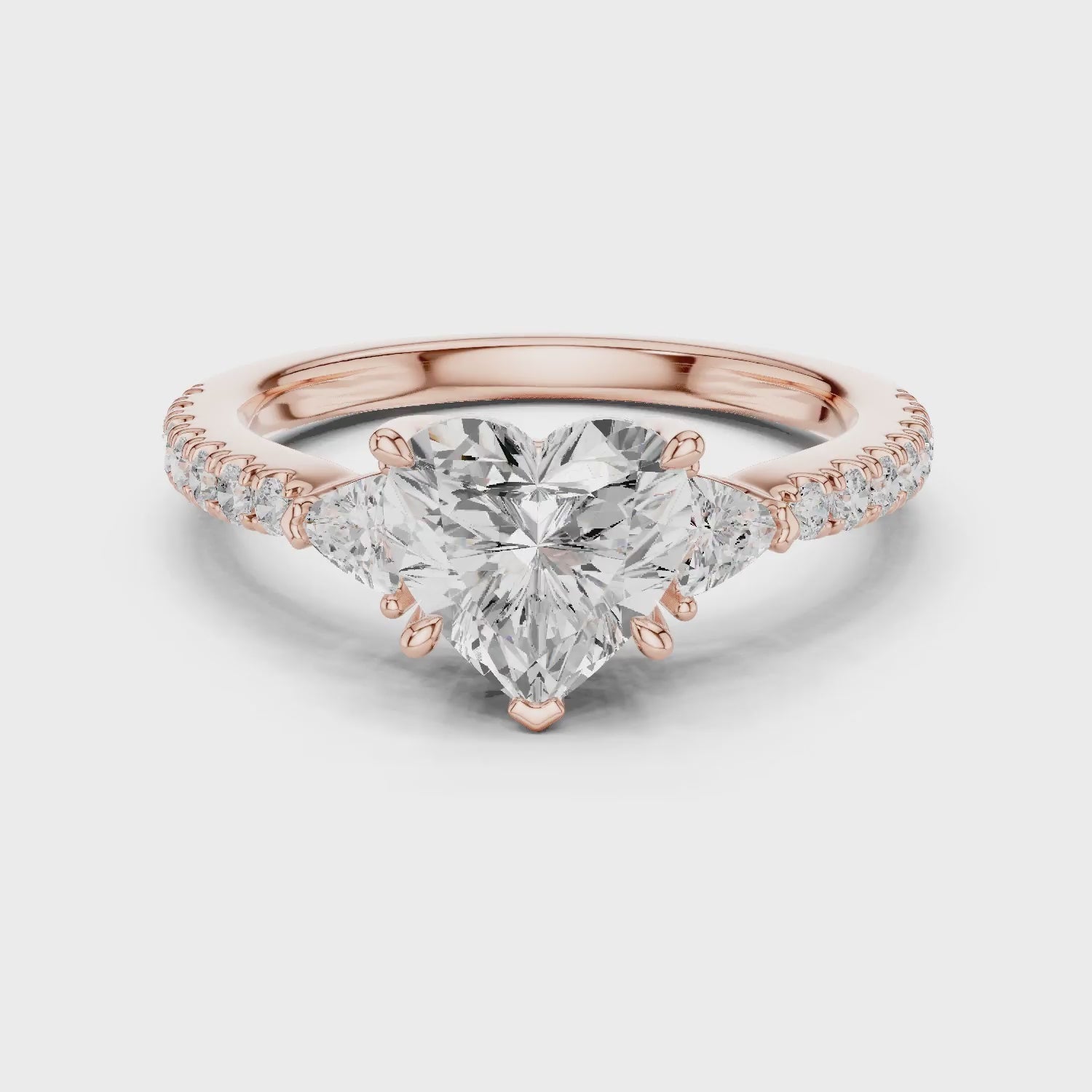 Heart Cut Diamond Three-Stone Engagement Ring with Pave Band